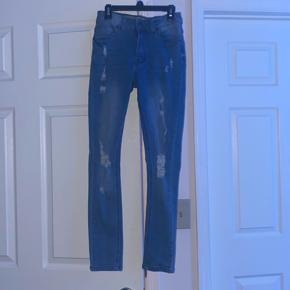 Pre-owned ripped VIP JEANS in size 1/2